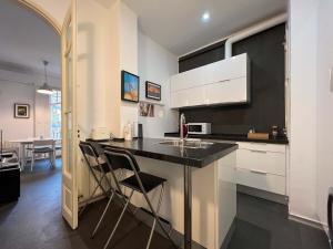 Kuchyň nebo kuchyňský kout v ubytování Stay Unique Apartments Cent