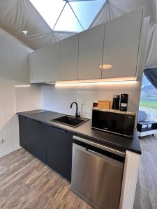 Kuchyň nebo kuchyňský kout v ubytování Glamping Dome - Rosé