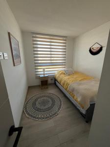 Postel nebo postele na pokoji v ubytování Hermoso y cómodo departamento en Concón - Ecocostas