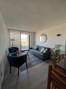 Posezení v ubytování Hermoso y cómodo departamento en Concón - Ecocostas