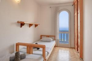 Postel nebo postele na pokoji v ubytování Seaside family friendly house with a swimming pool Prigradica, Korcula - 21022 + 23 fotografií