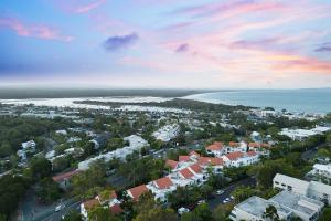 an aerial view of a city and the ocean at Noosa International Resort in Noosa Heads