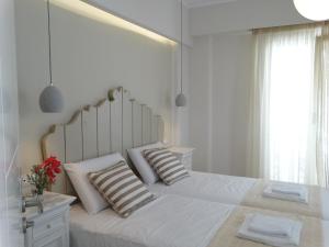 Llit o llits en una habitació de Anassa Suites