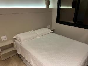 Ένα ή περισσότερα κρεβάτια σε δωμάτιο στο casa de campo rústica para show rural