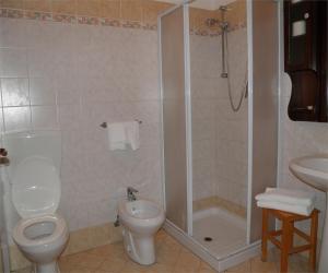 Kúpeľňa v ubytovaní Hotel Bellagio