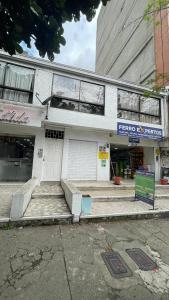 a store front of a building on a street at apartamento entero en santa Gema interior 202 in Medellín