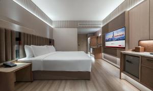 Voodi või voodid majutusasutuse Intercity Shenzhen Futian Huanggang with Free Mini Bar toas