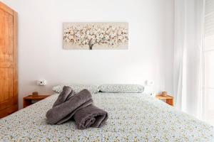 Łóżko lub łóżka w pokoju w obiekcie Exclusivo "Gran Bilbao" Suite Deluxe PARKING OPCIONAL