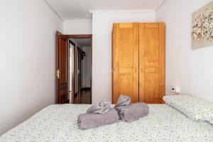 Łóżko lub łóżka w pokoju w obiekcie Exclusivo "Gran Bilbao" Suite Deluxe PARKING OPCIONAL