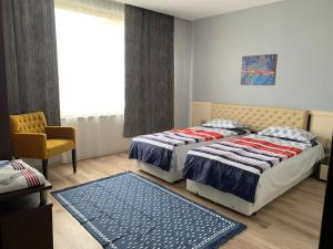 A bed or beds in a room at Sea Apartment 3bedrooms