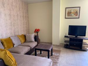 A television and/or entertainment centre at Sea Apartment 3bedrooms