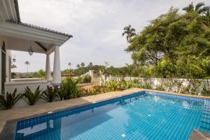 Φωτογραφία από το άλμπουμ του LohonoStays Maison9 Estate 6 Bedroom σε Vagator