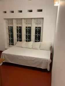 Letto o letti in una camera di Unrushed Midigama