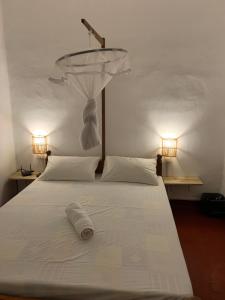 Letto o letti in una camera di Unrushed Midigama