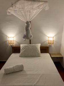 Letto o letti in una camera di Unrushed Midigama