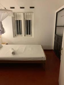 Letto o letti in una camera di Unrushed Midigama