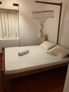 Letto o letti in una camera di Unrushed Midigama