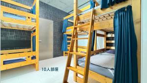 Postel nebo postele na pokoji v ubytování Hotel Adonis Tokyo - Dormitory Share Room For Male Only At City Center