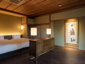 Krevet ili kreveti u jedinici u okviru objekta Ryokan Onomichi Nishiyama