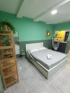 Ліжко або ліжка в номері Vasciò Napoli