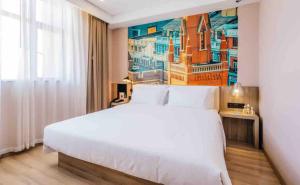 Letto o letti in una camera di Atour Hotel (Shanghai International Tourism and Resorts Zone XiuYan Road)