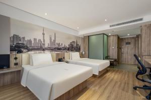 Letto o letti in una camera di Atour Hotel (Shanghai International Tourism and Resorts Zone XiuYan Road)