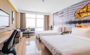 Letto o letti in una camera di Atour Hotel (Shanghai International Tourism and Resorts Zone XiuYan Road)