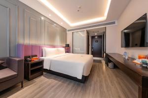 TV a/nebo společenská místnost v ubytování Atour X Hotel Beijing Sanyuan Bridge