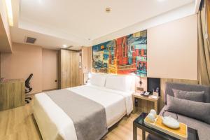 Letto o letti in una camera di Atour Hotel (Shanghai International Tourism and Resorts Zone XiuYan Road)