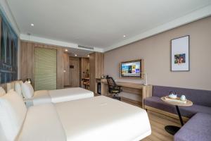 TV o dispositivi per l'intrattenimento presso Atour Hotel (Shanghai International Tourism and Resorts Zone XiuYan Road)