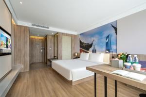 Letto o letti in una camera di Atour Hotel (Shanghai International Tourism and Resorts Zone XiuYan Road)