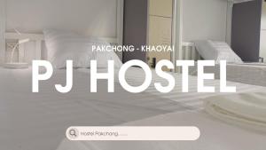 PJ Hostel客房内的一张或多张床位