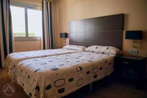 Postel nebo postele na pokoji v ubytování Albir Palace