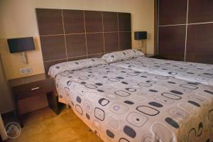 Postel nebo postele na pokoji v ubytování Albir Palace