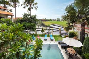 Der Swimmingpool an oder in der Nähe von Canggu Bona Kubu by Kamara