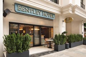 a entrance to a hotel with potted plants in front of it at Bentley Hotel Old City-Special Class in Istanbul