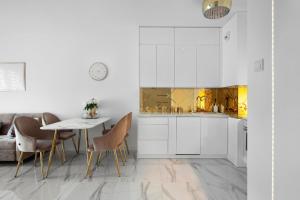 Ett kök eller pentry på Elite Apartments Letnica Glamour