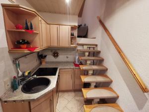 Kuchyň nebo kuchyňský kout v ubytování Schnorr-Villa