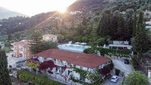 an aerial view of a house with a swimming pool at Islands View in Nydri