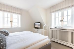 Ein Bett oder Betten in einem Zimmer der Unterkunft Haus Seaside