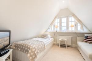 Ein Bett oder Betten in einem Zimmer der Unterkunft Haus Seaside