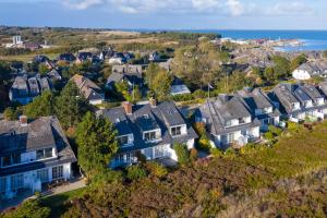 an aerial view of a residential neighborhood with houses at Wattblick in Munkmarsch +17 photos
