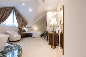 Posteľ alebo postele v izbe v ubytovaní Hotel Bohemian Garni - Skadarlija