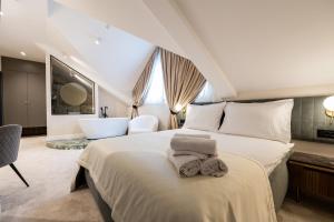 Posteľ alebo postele v izbe v ubytovaní Hotel Bohemian Garni - Skadarlija