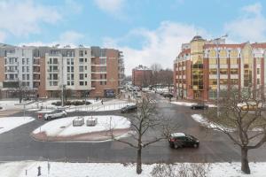 Cozy Apartment with Balcony in Central Gdańsk Długie Ogrody by Noclegi Renters v zime