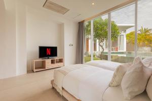 TV/Unterhaltungsangebot in der Unterkunft Taman Mesari Luxury Villas-Seminyak