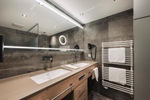 Koupelna v ubytování Hotel Piz Buin