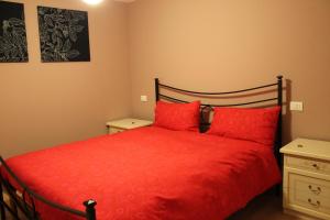 Postel nebo postele na pokoji v ubytování B&B Val Maschi
