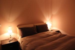 Postel nebo postele na pokoji v ubytování B&B Val Maschi