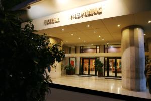 a lobby of a mall with a mgmeling sign on it at Hotel Memling in Kinshasa